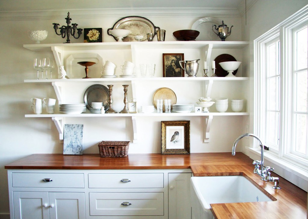 Open shelves in the interior of the kitchen wall