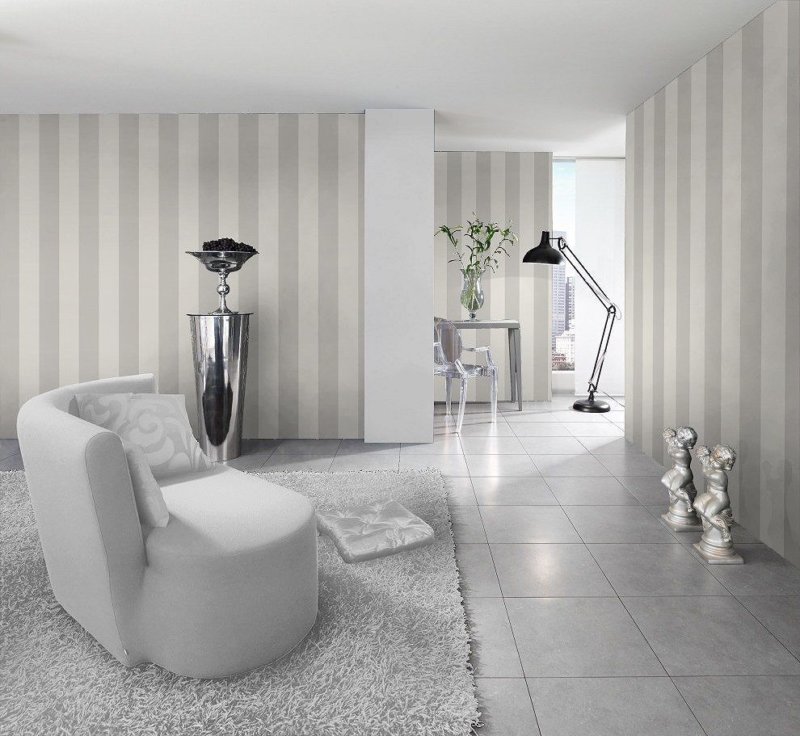 Living room interior in pastel shades with gray striped wallpaper