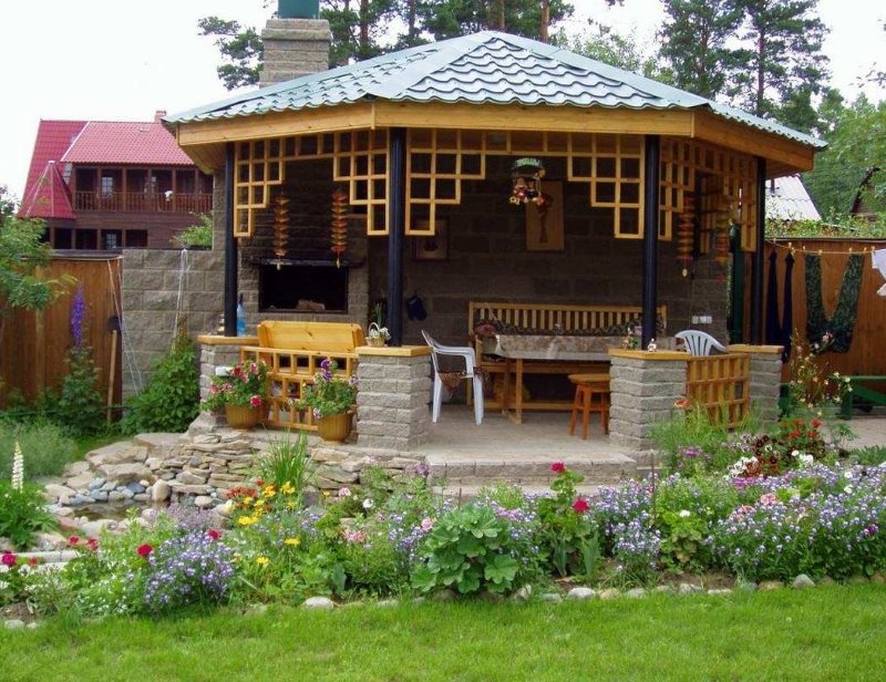 Semi-open garden arbor on a stone platform