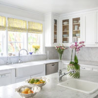 Provence style kitchen with moldings above the cupboards