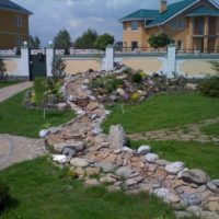 Dry creek in the landscaping of the garden