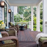 Rattan furniture on the outdoor terrace of the country house