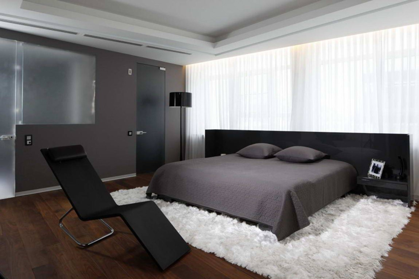 Bedroom with dark high-tech furniture