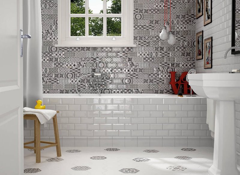 Light glossy tiles in the interior of the bathroom