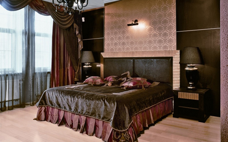 Dark bedroom design of a city apartment