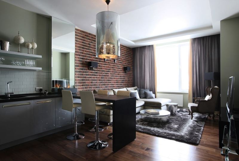 Brick wall in a sitting area in the kitchen-living room