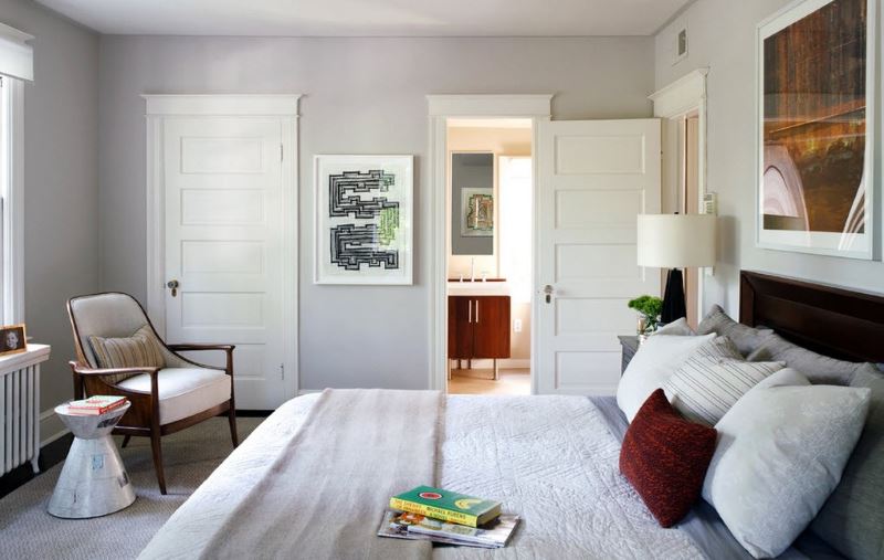 Two white doors in the bedroom interior