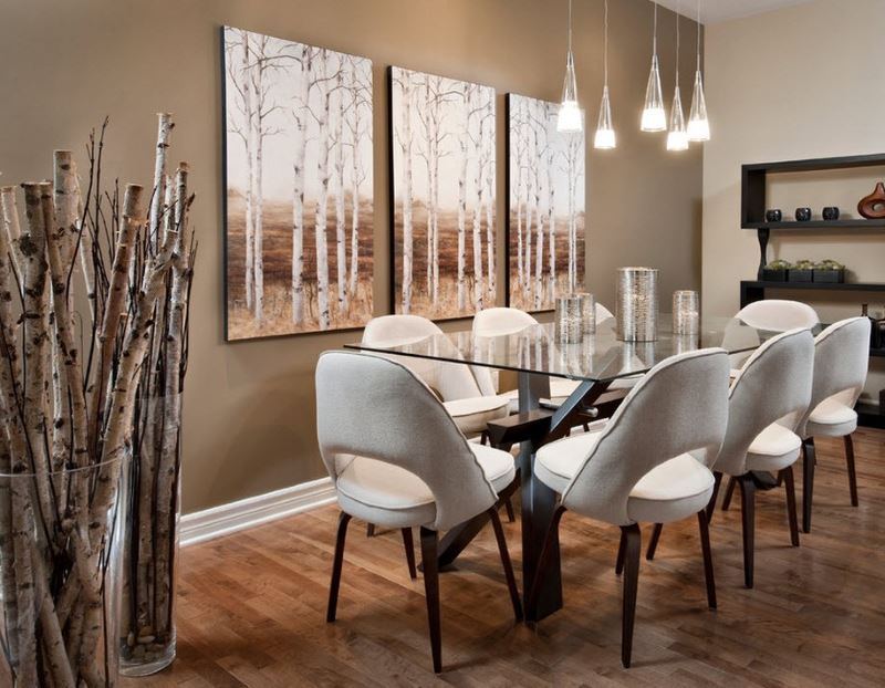 Transparent vase with birch branches in the design of the living room