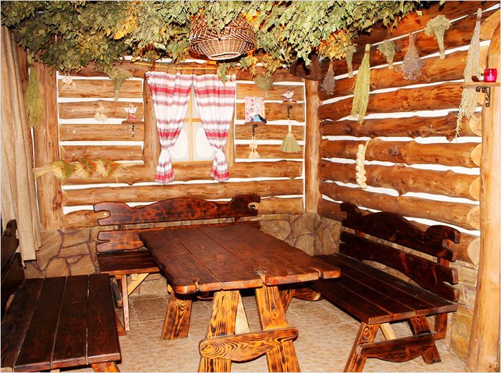 Country style dressing room interior with benches for relaxation