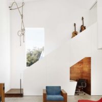 Staircase to the second floor of a private house in the spirit of minimalism