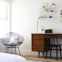 dark desk in the white bedroom