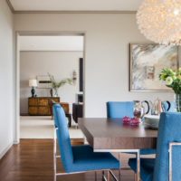 Blue chairs in a white living room