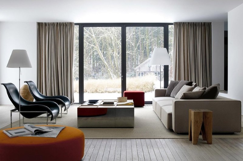 Wooden floor in the living room of a country house in contemporary style