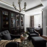 Black furniture in the interior of the living room