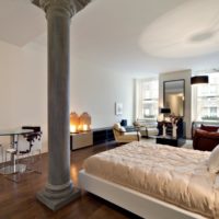 Interior of a modern bedroom with a pillar