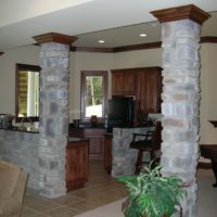 Natural stone columns in the kitchen of a private house