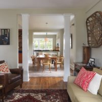 Paired columns between the kitchen and the sitting area