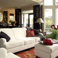 Upholstered furniture with white upholstery in the interior of the living room