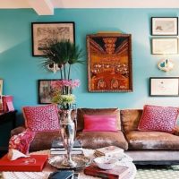 Red pillows on the sofa in the living room