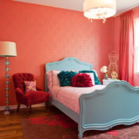 Pink bedspread on the bed in the nursery