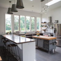 Chandelier in the interior of the kitchen-living room