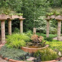 Antique columns in the garden landscape