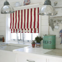 Striped curtains in the kitchen of a private house