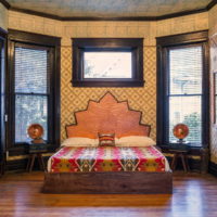 Oriental-style bedroom with wooden floor