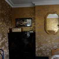 Dark chest of drawers in the bedroom of a private house