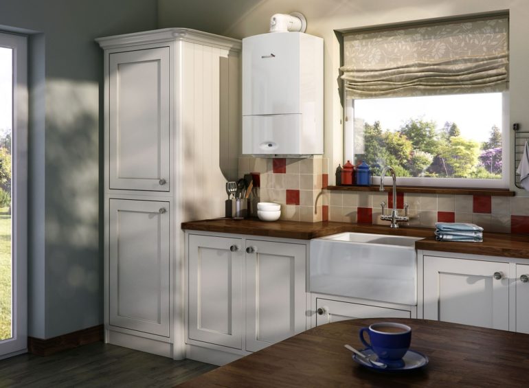 Kitchen interior with gas boiler on the wall near the window