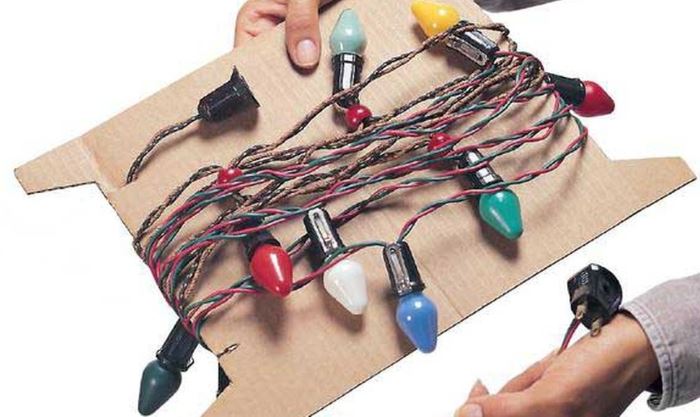 Storage of Christmas garland on a piece of corrugated cardboard