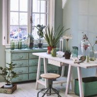 Peppermint chest of drawers under the window in the living room