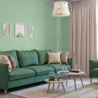 Mint wall in the living room with beige curtains