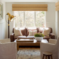 Cream upholstered chairs in the living room of a private house