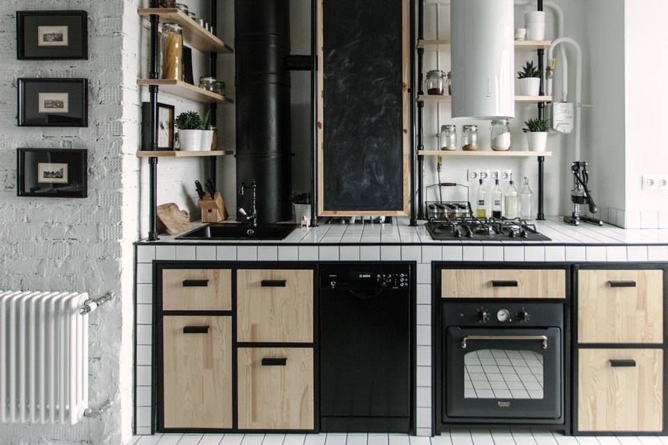 Loft style kitchen interior with gas boiler