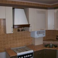 Partially closed gas boiler in the interior of the kitchen