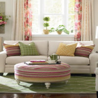 White sofa in the living room with pink decor