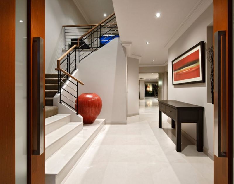 Hall of a private house with a red floor vase