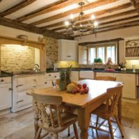 Carved wooden chairs in the kitchen of a private house