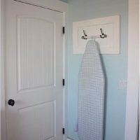 Ironing board hanger