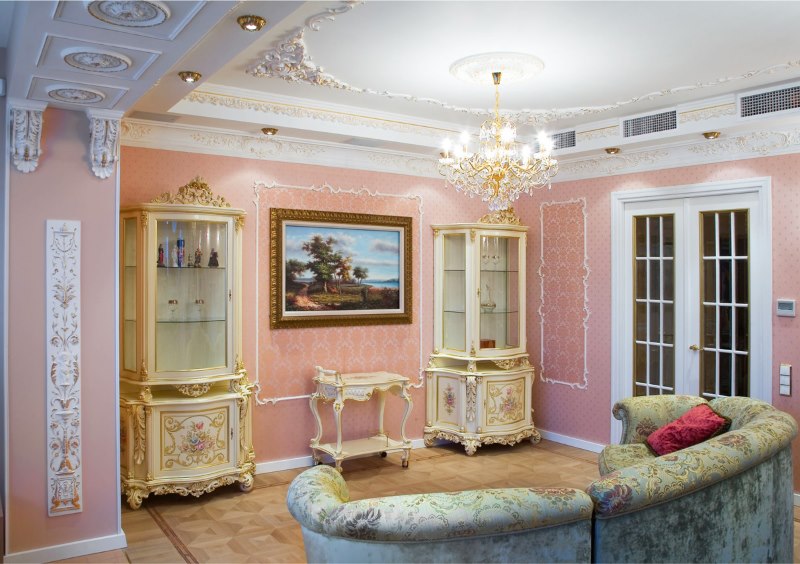 Crystal chandelier on the ceiling of the living room in a classic style