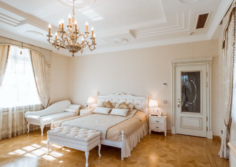 Bright door with glass in the interior of a classic bedroom