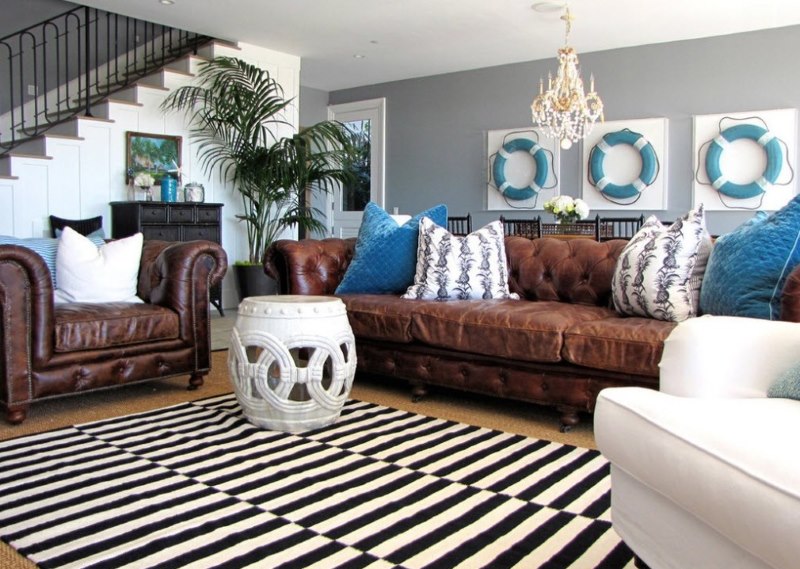 Striped carpet in front of a brown sofa