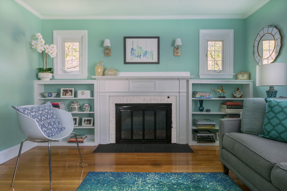 The combination of mint walls with brown floor in the living room