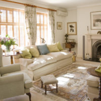 Living room with fireplace in bright colors