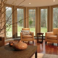 Large windows in the living room of a private house