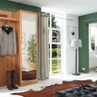 Hallway of a country house with green walls