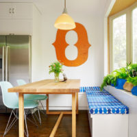 Table in a modern style in the kitchen of a private house