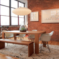 Wooden table in the loft style kitchen