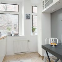 Gray table in the interior of the kitchen